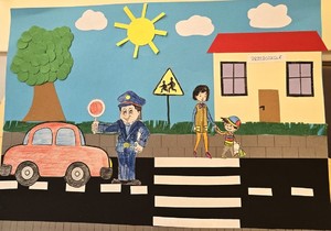Zdjęcie przedstawia pracę dziecka, na której jest policjant.