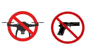 zdjęcie kolorowe : grafika przedstawiająca zakaz broni i lotów dronami
