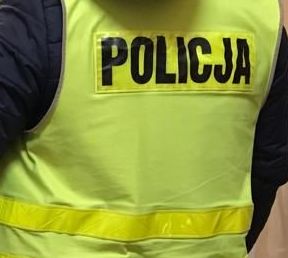 Zdjęcie policjanta w kamizelce odblaskowej