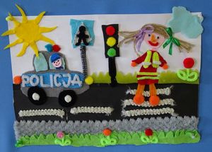 rysunek dziecka przedstawiający radiowóz i policjantkę